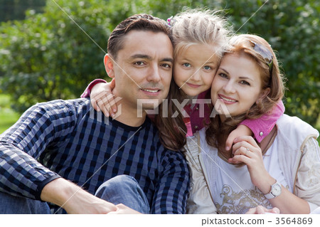 happy family of three outdoors happy family of three outdoors 3564869