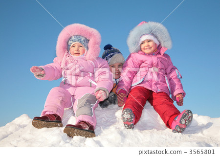 Three children in snow 3565801