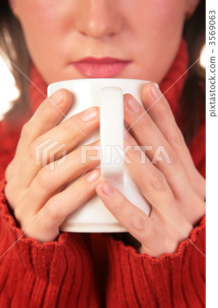 young woman with cup in hands 3569063