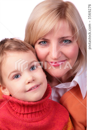 Middleaged woman with kid face close-up 3569276