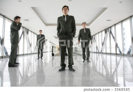 identical men on footbrige 3569585