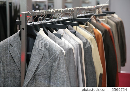 clothes on racks in shop 3569734
