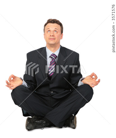 meditating businessman meditating businessman 3571576