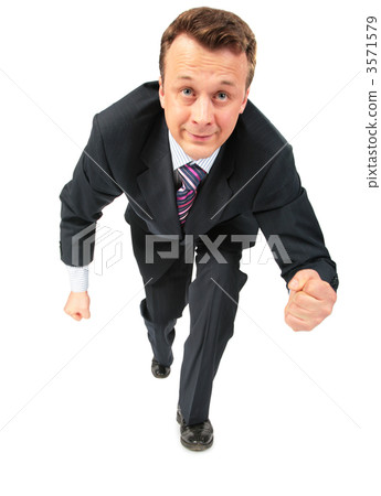 businessman runs having compressed fists 3571579