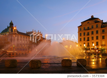 Fountain on square in evening 3573384
