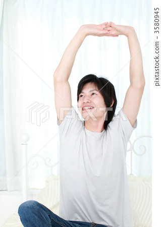 Male relaxing in bed 3580945