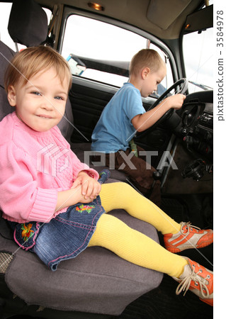 Girl and boy in car Girl and boy in car 3584978