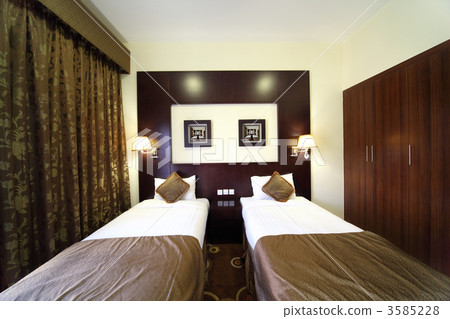 bedroom with white walls, wardrobe and two beds front general vi 3585228