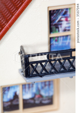 Fragment of toy plastic house with balcony Fragment of toy plastic house with balcony 3587044