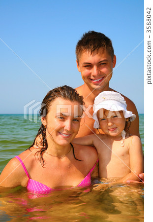 Family pose in sea Family pose in sea 3588042