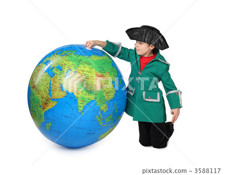 boy in historical dress sits near big  inflatable globe isolated 3588117