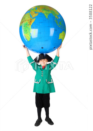 little boy in historical dress holding big inflatable globe over little boy in historical dress holding big inflatable globe over 3588122