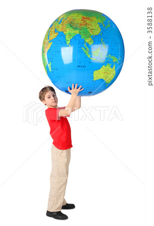 boy in red shirt holding big inflatable globe over his head side boy in red shirt holding big inflatable globe over his head side 3588138