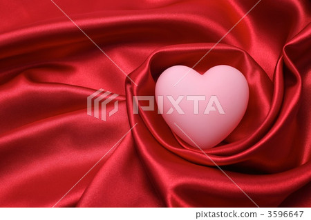 A heart wrapped in red cloth A heart wrapped in red cloth 3596647