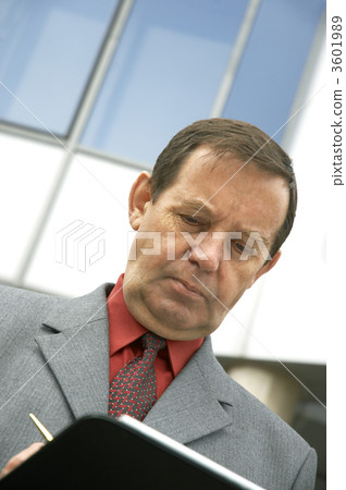 businessman signing a treaty 3601989