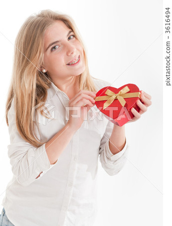 Young Girl with heart-shaped box 3616494