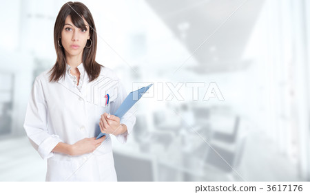 Standing woman in lab coat with folder 3617176