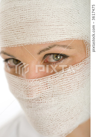 Close-up shot on bandaged face 3617475