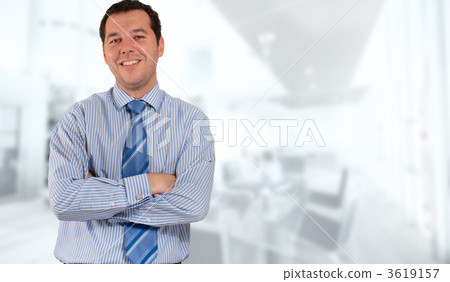 Smiling Businessman at the office Smiling Businessman at the office 3619157