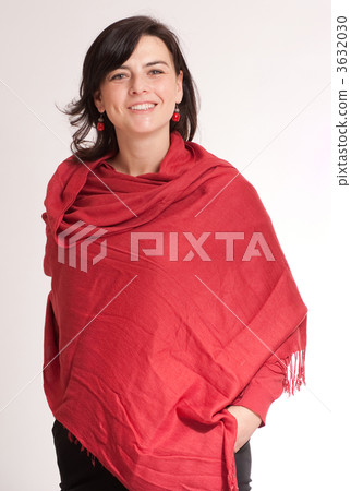 Smiling brunette in a red shawl 3632030