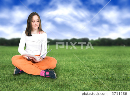 beautiful girl reading outdoors beautiful girl reading outdoors 3711286