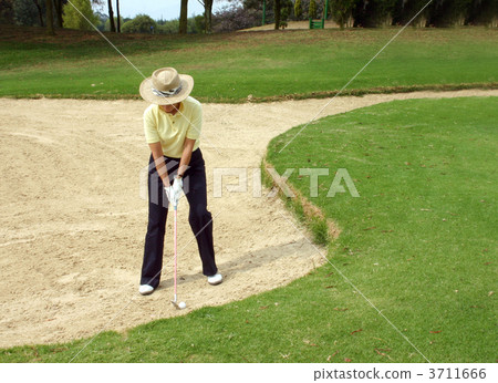 golfer in bunker 3711666