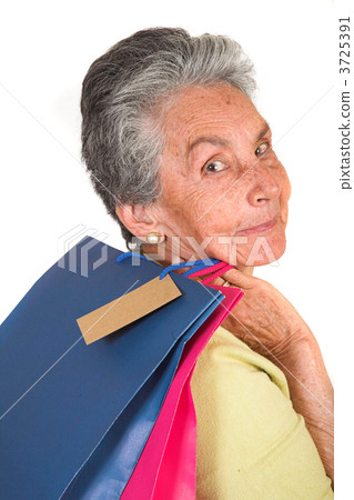 beautiful elderly woman with shopping bags 3725391