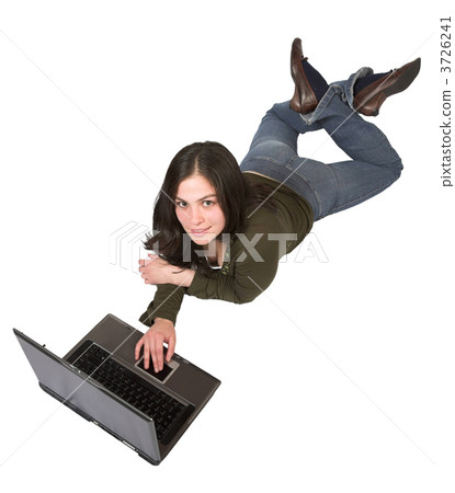 beautiful girl using a laptop on the floor 3726241