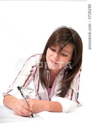 beautiful teenager studying on the floor 3726286