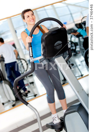 Girl exercising at the gym Girl exercising at the gym 3746446