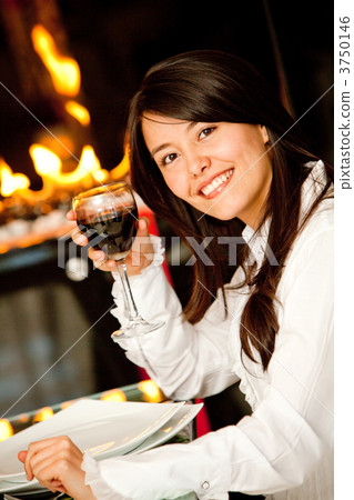 Woman at a restaurant Woman at a restaurant 3750146