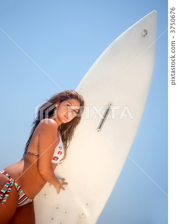 Female surfer 3750676