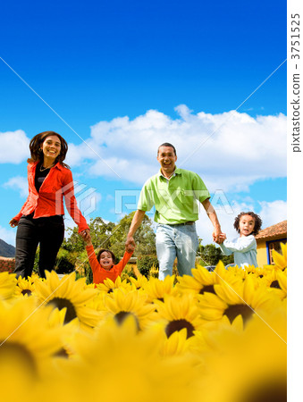 Family in a field of sunflowers Family in a field of sunflowers 3751525