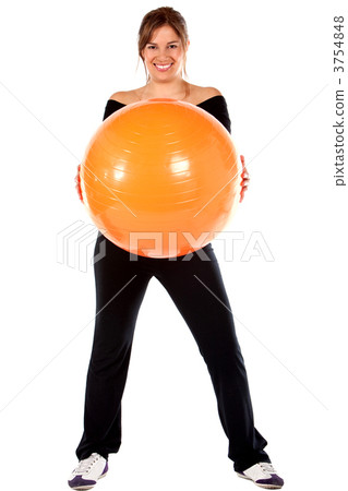 Woman with a pilates ball Woman with a pilates ball 3754848