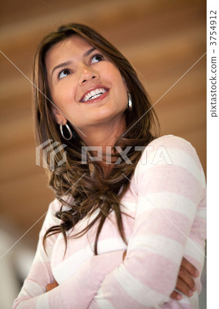 Pensive woman smiling 3754912