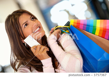 Shopping woman with a credit card 3757367