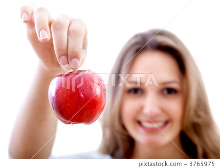 Woman holding an apple 3765975