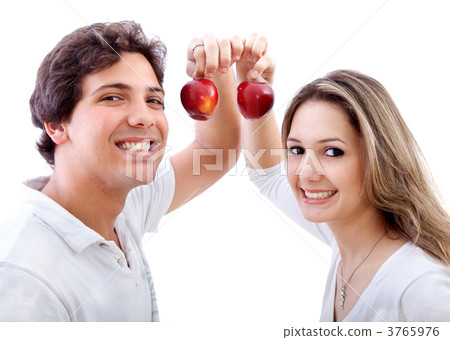 Couple holding some apples Couple holding some apples 3765976