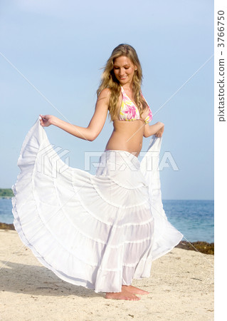Woman at the beach. 3766750