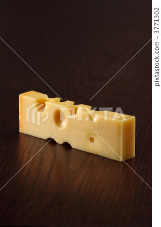 Swiss cheese on a table Swiss cheese on a table 3771302