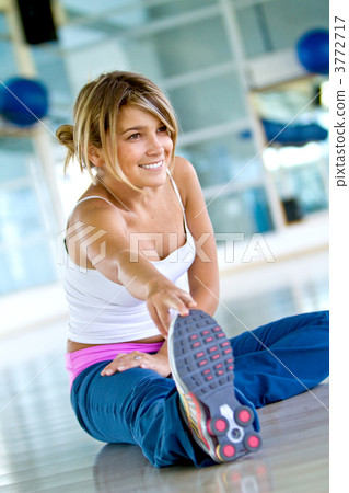 Gym woman stretching 3772717