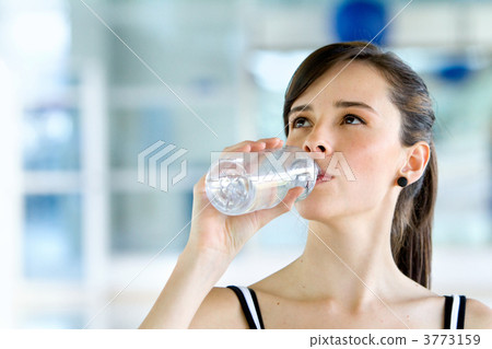 Gym woman drinking water Gym woman drinking water 3773159