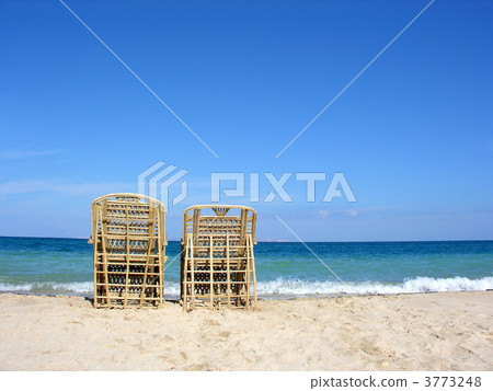 two chairs. beach. two chairs. beach. 3773248