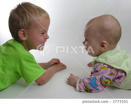 child with baby on white child with baby on white 3773501