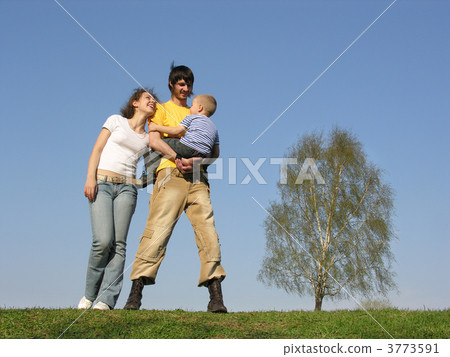 family stand with son. spring family stand with son. spring 3773591
