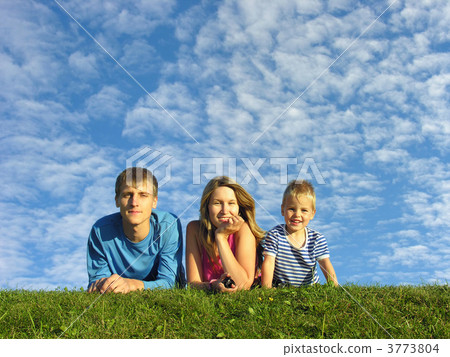family on herb under blue sky family on herb under blue sky 3773804