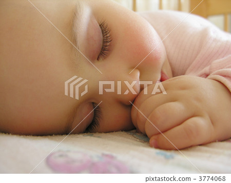 sleeping baby with hand 3774068