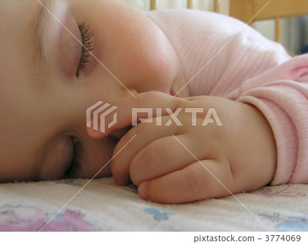 sleeping baby with hand 2 3774069