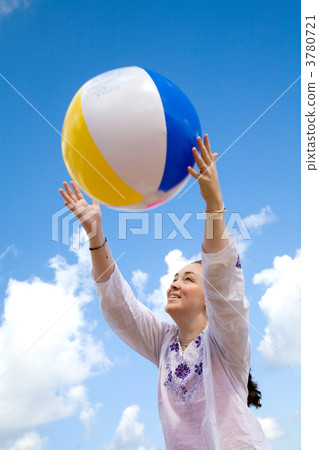 fun at the beach with a beachball 3780721