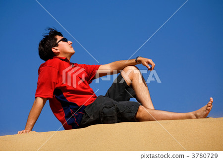 man relaxing at the beach man relaxing at the beach 3780729